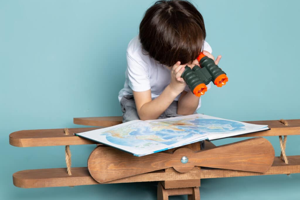 kid learning the map